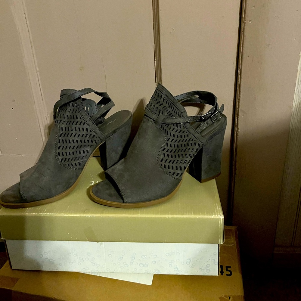 American Eagle gray suede open toe boots.